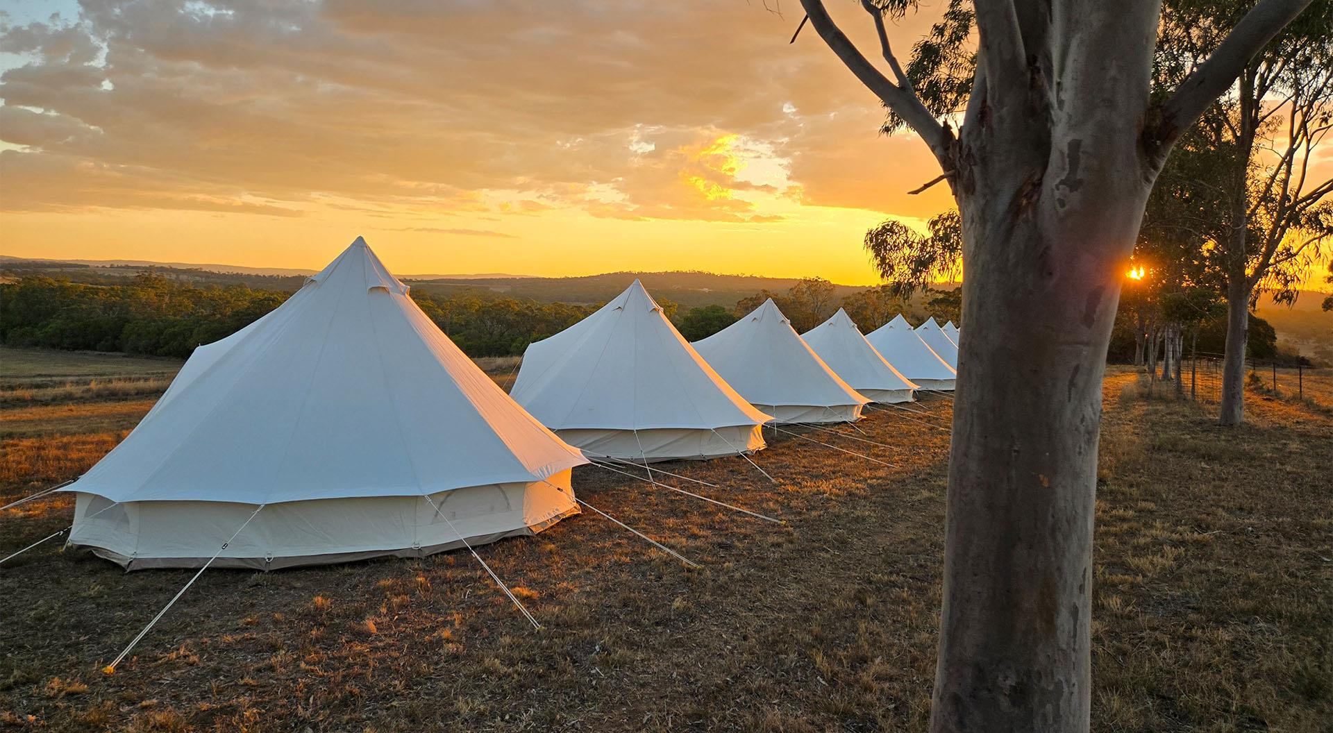 Bell Tent Hire Co tent village setup in field