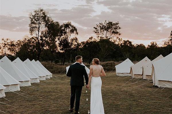 Glamping tent village setup for a wedding