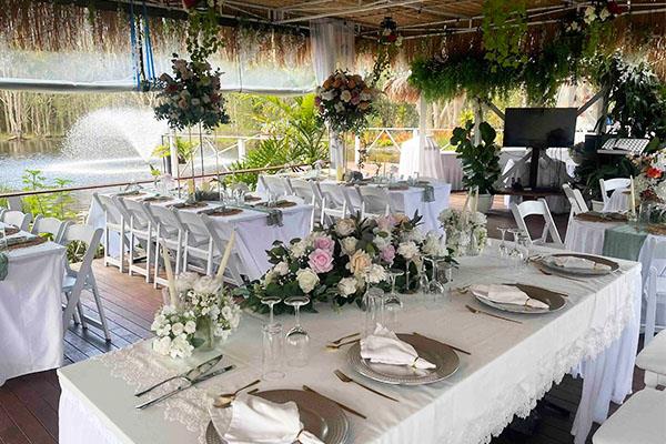 Wedding reception table setting overlooking The Rose Garden pond