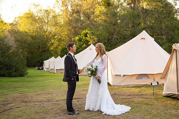 Glamping tent village setup for a wedding
