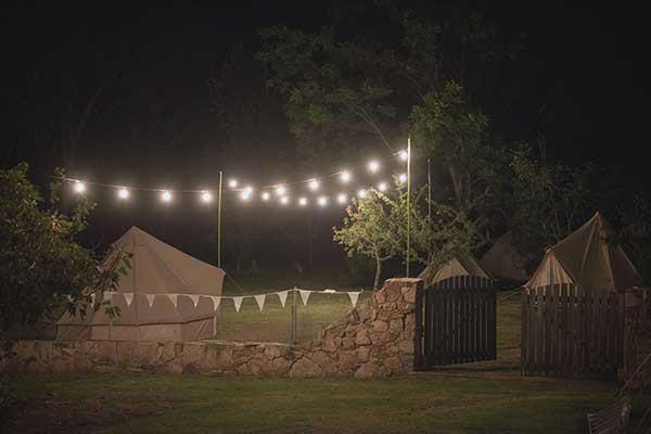 Bell tents setup in filed suitable for festival or retreat