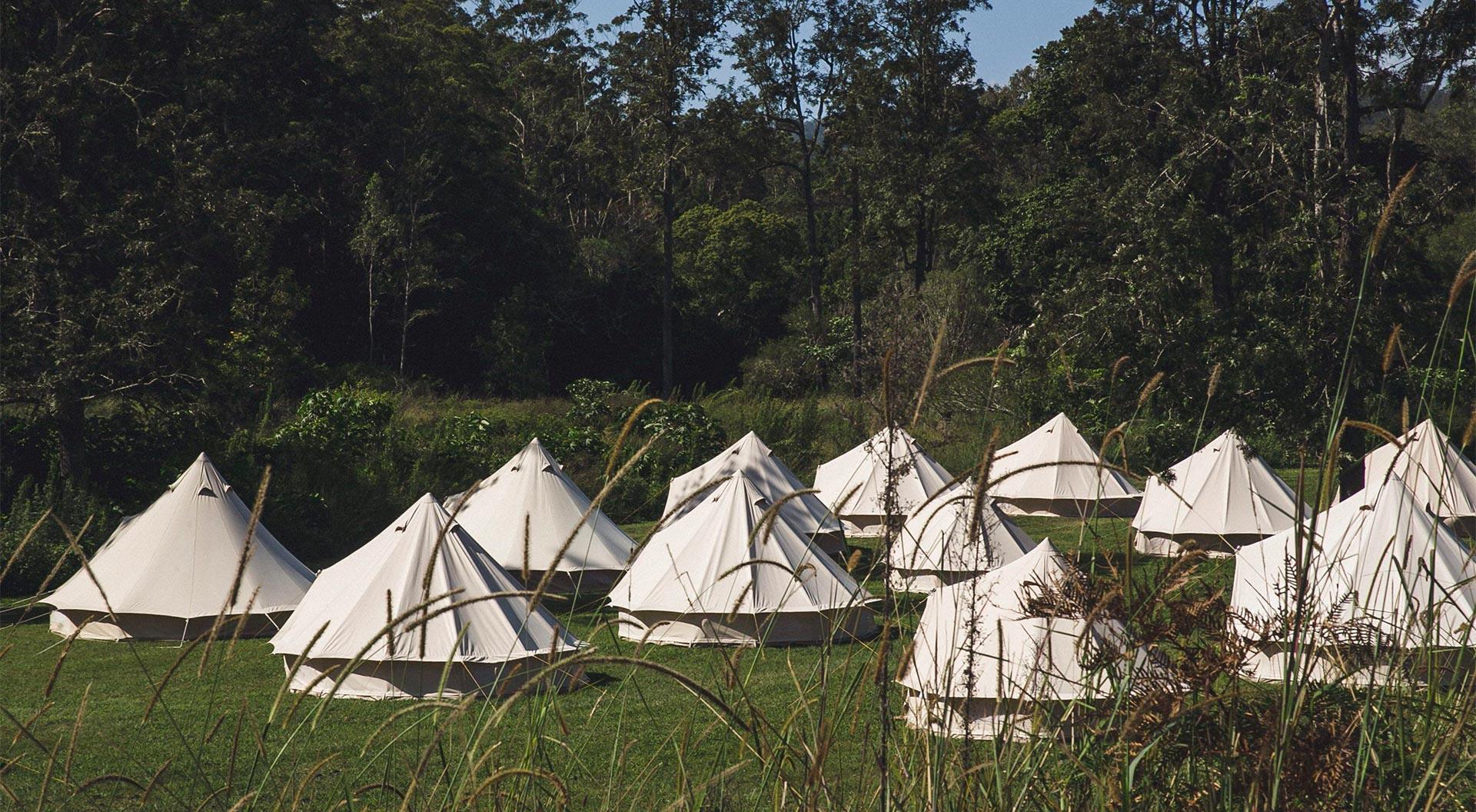 glamping bell tent village in field